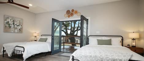 A view of the spacious main bedroom, as you walk out onto your own private deck