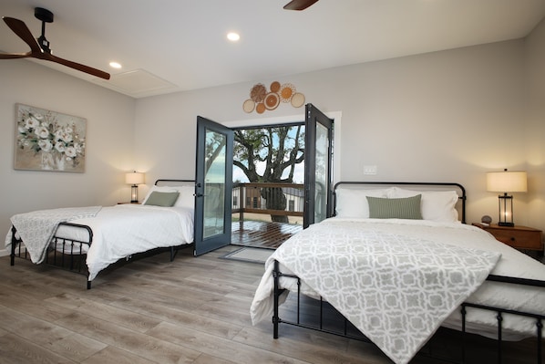 A view of the spacious main bedroom, as you walk out onto your own private deck