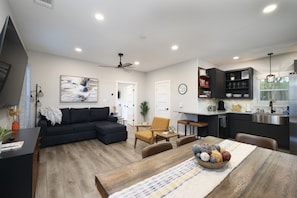 Main living area, kitchen, and dining table