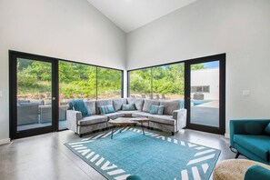 Living room looking at the pool and dunes