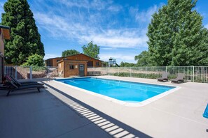 Backyard pool is the perfect spot to enjoy summer afternoons and evenings, or fall evenings for that matter as the pool is HEATED through the middle of October!