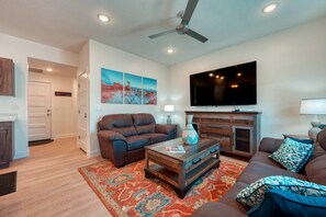 Cozy up for a movie night! Plush couches and a large Smart TV make the living room the perfect place to wind down after a day of exploration.