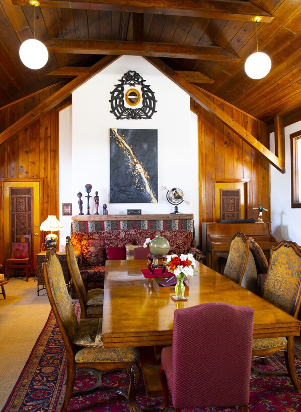 Large living space which includes a grand table to gather around!