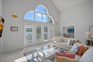 Main Level living room with lake views.