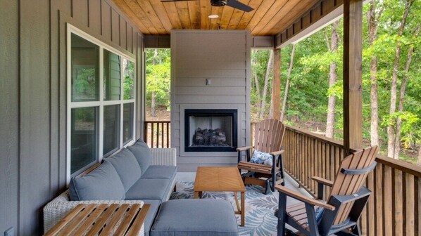 Cozy seating area with Fireplace on Deck