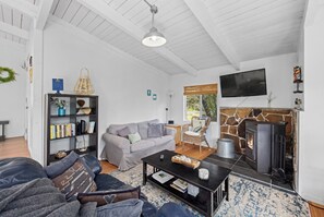 Cozy up in the living space and check out the VHS collection!