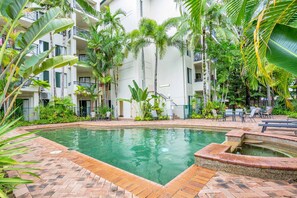 Complex pool with spa pool and BBQ area