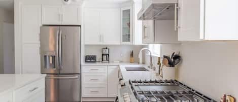 Fully equipped kitchen with updated appliances
