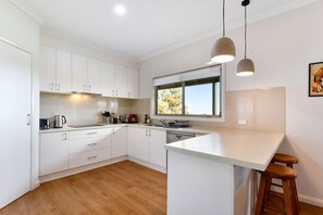 Fully equipped kitchen - electric hob and oven, dishwasher, microwave, Nespresso