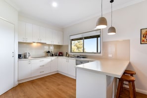 Fully equipped kitchen - electric hob and oven, dishwasher, microwave, Nespresso