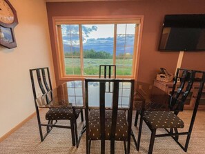 Watch the clouds roll by the mountains from the dining room