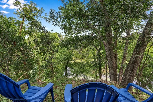Seating behind the home with waterviews.