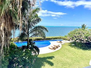 Garden, pool and ocean view from balcony