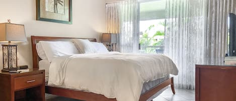 Enjoy a crisp, luxurious king bed after a day exploring Maui