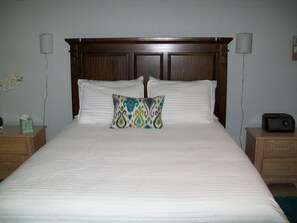 Comfortable queen bed in master bedroom