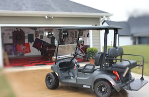 Golf cart to get around neighborhood is included in every rental!