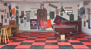 Garage has AC, heating, & insulation making it comfortable regardless of weather