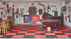 Garage has AC, heating, & insulation making it comfortable regardless of weather