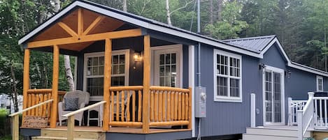 Front porch and side deck, driveway view.