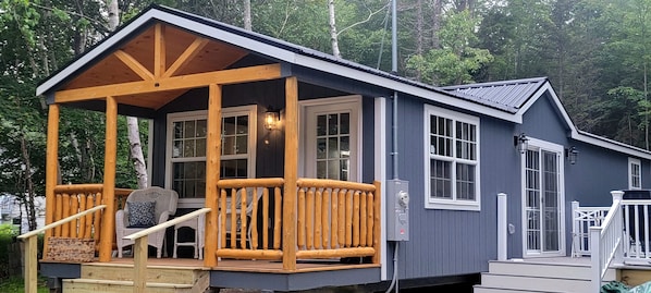 Front porch and side deck, driveway view.