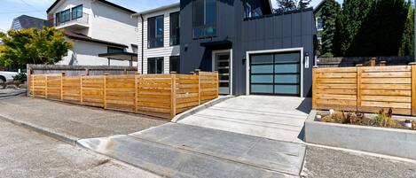 Our home has a parking space in the garage as well as behind it. 