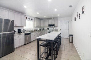 Open full kitchen and dining for 8