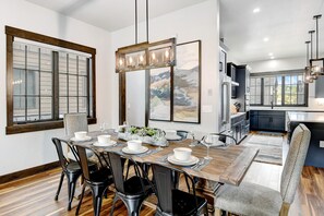 Stunning Dining Room Area With Seating For 10 People