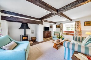 Lower Farm Cottage, Stalbridge Weston: Relax in the sitting room with the wood burning stove