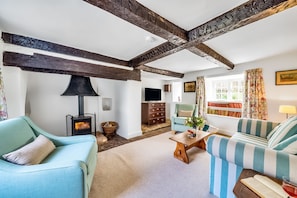 Lower Farm Cottage, Stalbridge Weston: Relax in the sitting room with the wood burning stove