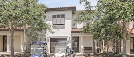 Front of Home & Two Golf Carts