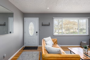 Front door entrance and bay window let in plenty of light