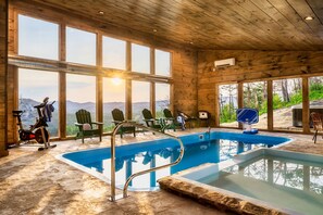 Our heated saltwater pool has the most epic Smoky Mountain views..Conveniently located just off the kitchen and secured with an alarm for added peace of mind. Follow us for more photos on our IG @GrandviewHolidays
