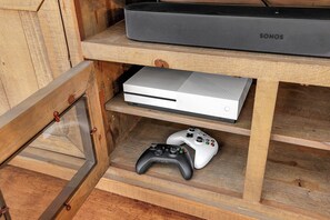 Gamers will love playing the XBox 360 on the 75" HDTV--the Sonos sound system takes it to the next level