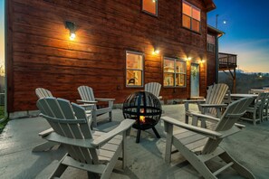 Outdoor patio with fire pit, Adirondack chairs, dining & (2) Charcoal BBQs!