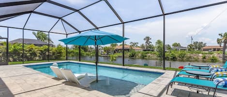 Crystal clear heated saltwater pool with breathtaking waterfront view