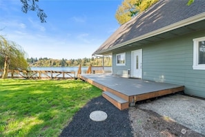 Main entrance and deck overlooking the lake