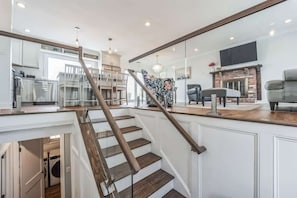 Stairs leading up to the kitchen