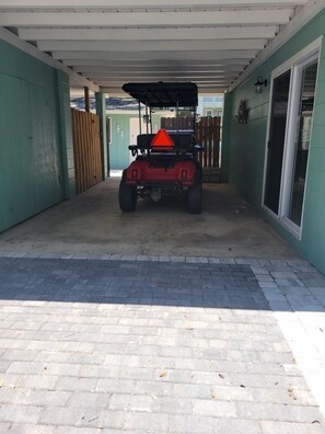 Covered Carport…Golf Cart not included but bring your own or rent one 