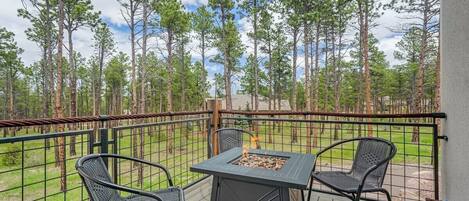 A firepit and chairs outside. Perfect place to hang out with your friends and family!