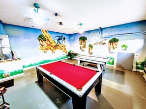 Avatar Themed Game Room with pool and air hockey table.