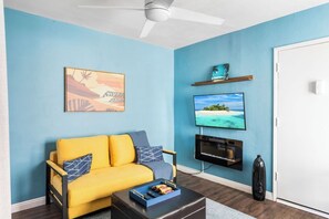 This studio has a sofa that folds out to a real queen size bed (60in x 80in). Place the supplied 4-inch foam mattress topper to create a very comfortable sleep. All bedding is supplied in the ottoman. 