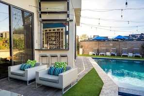 Surrounded by tropical landscaping, our private pool is the perfect oasis for relaxation and fun.