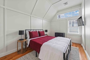 Left Side Bedroom with Queen bed, Ceiling fan, Roku TV, and dresser