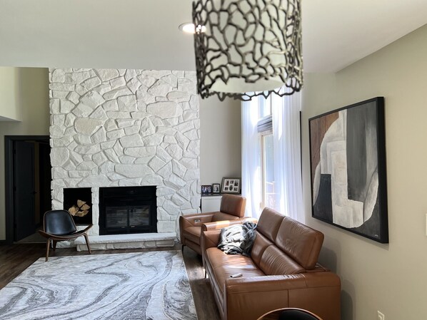 Gorgeous living room space with 20 ft vaulted ceilings 