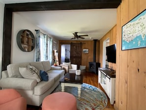 Cozy living room with fireplace and smart TV