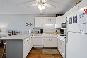 A fully stocked kitchen makes meal preparation a breeze.