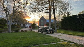 entrance of house facing west for lovely sunset views, including outdoor area