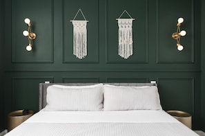 Primary bedroom with a comfortable king bed, ensuite bath, and plenty of closet space for your clothes.