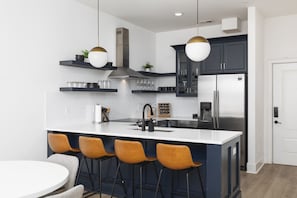 Seating for 4 at the kitchen counter. Fully-equipped kitchen with high-end appliances!