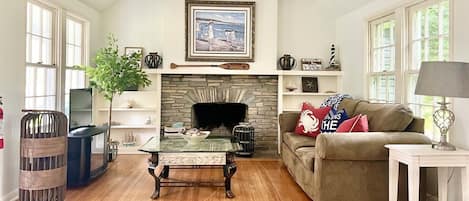 Beautiful natural light amongst the trees! Love this living room